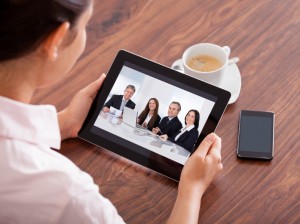 Woman Video Conferencing On Digital Table